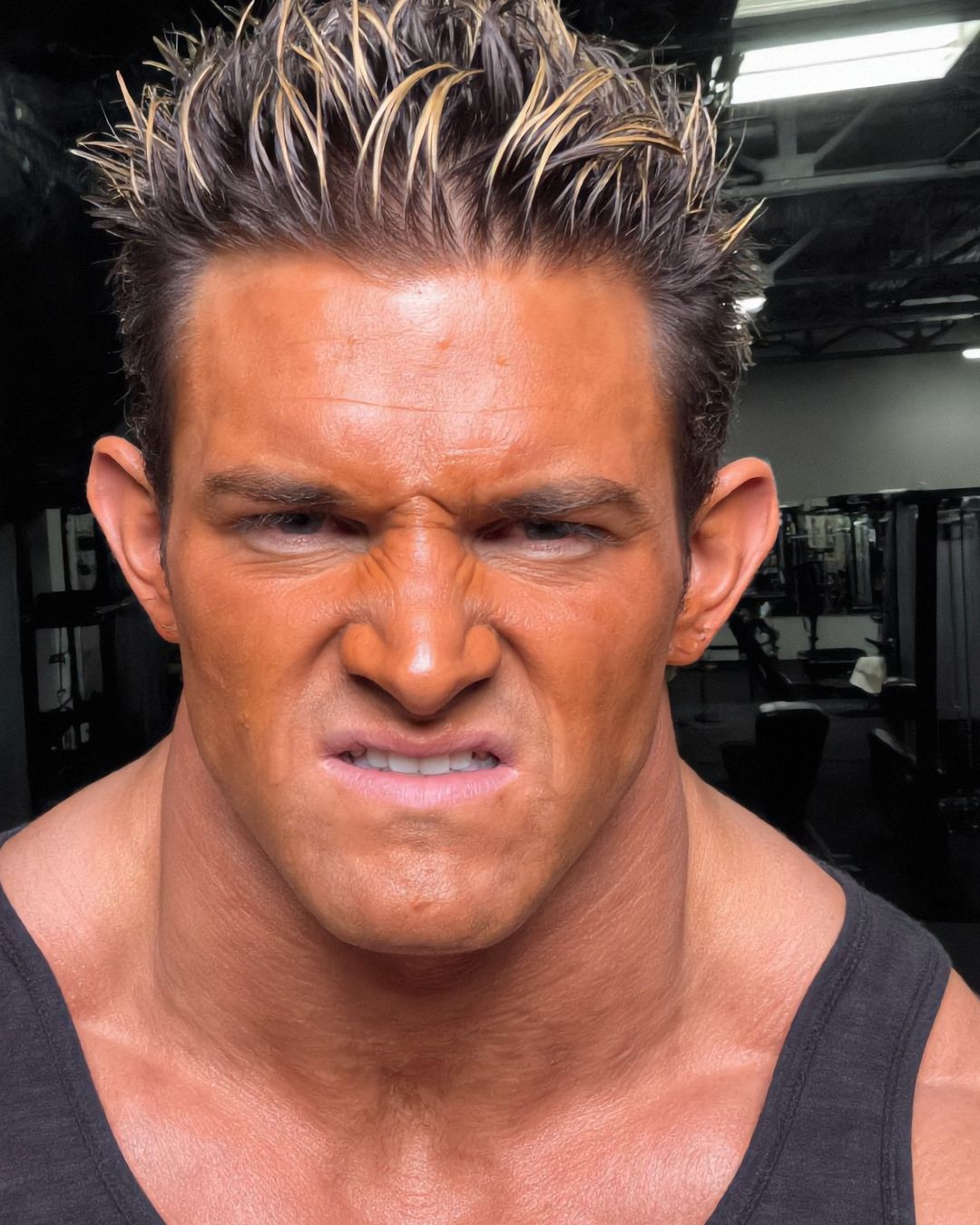 Extreme close-up of Elon Muskle's scowl